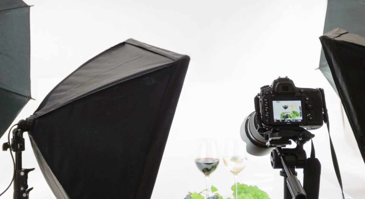 A photo of a product in a studio with a camera and lighting equipment.