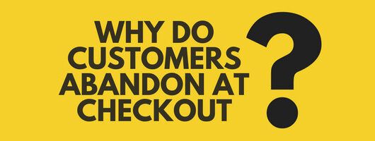 A yellow sign with black text that reads "Why do customers abandon at checkout?"