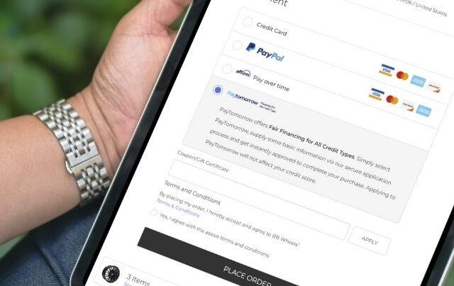 Man using tablet in BBWheels Checkout seeing Affirm and Paytomorrow financing solutions