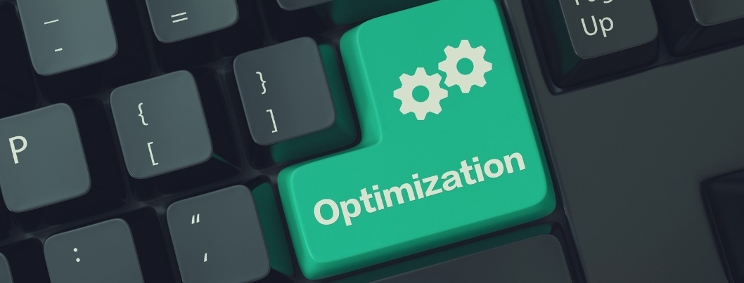Green "Optimization" button on a computer keyboard
