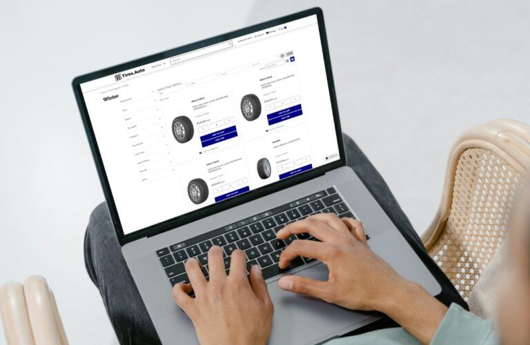 Person browsing Tires.auto on laptop - BigCommerce apps integrations