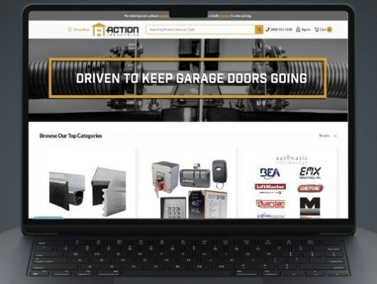 Garage door company website on laptop screen.