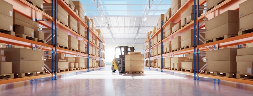 forklift in middle of warehouse with shelve of boxes