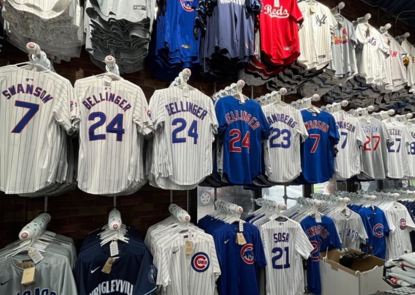 Sports World Chicago In-Store Merchandise - Sports Jerseys hanging on racks